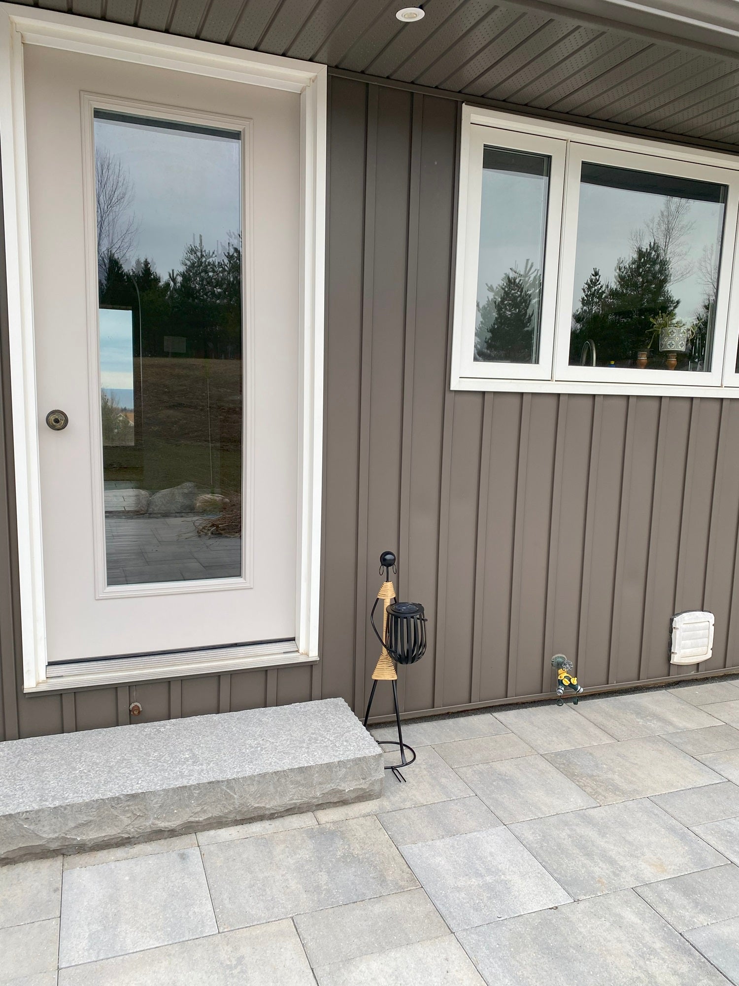 Abstract Tribal Lady Figurine Metal Sculpture holding Solar LED light